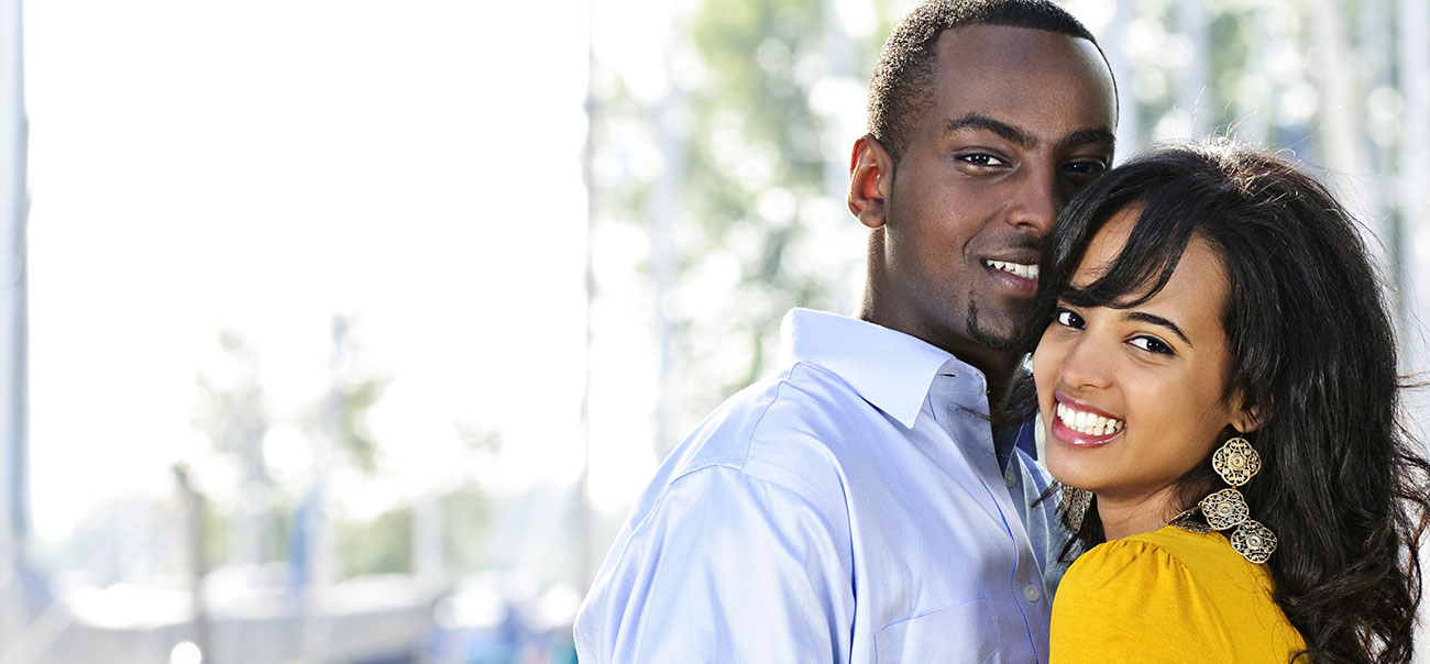 Couple smiling after visiting their trusted dentist in Tysons Corner