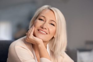 older woman wearing dentures in Tysons Corner